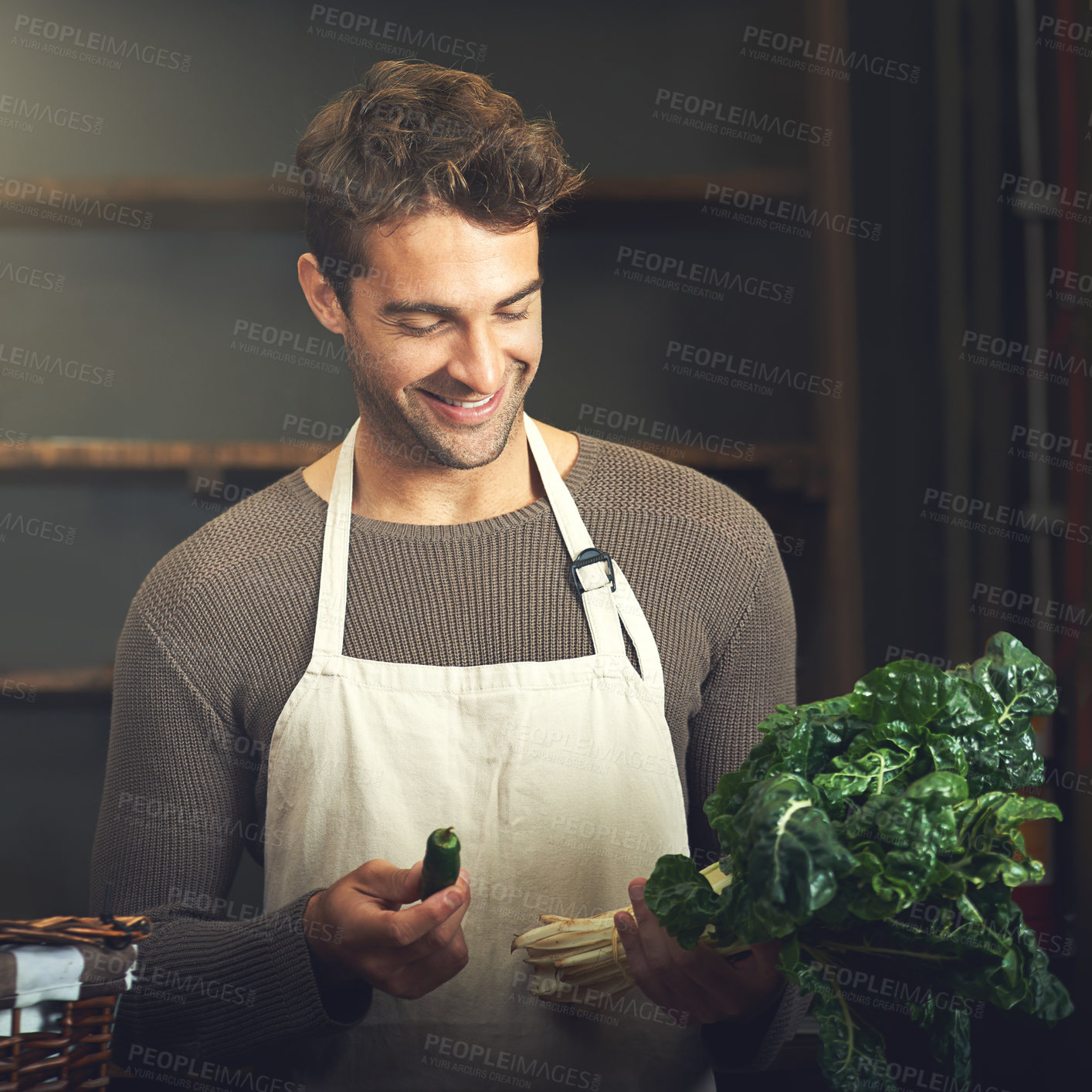 Buy stock photo Food, happy man with vegetables and chef in kitchen in his home. Healthy or nutrition diet with spinach, ingredients or recipe and smiling male person with apron prepare green salad at his house