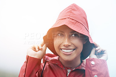 Buy stock photo Woman, happy and raincoat for protection, outdoor nature and waterproof jacket for weather or overcast. Female person, smile and safety or shield from cold, winter and travel to Scotland for holiday