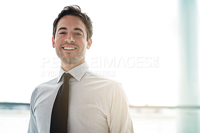 Buy stock photo Cropped portrait of a businessman standing in the lobby