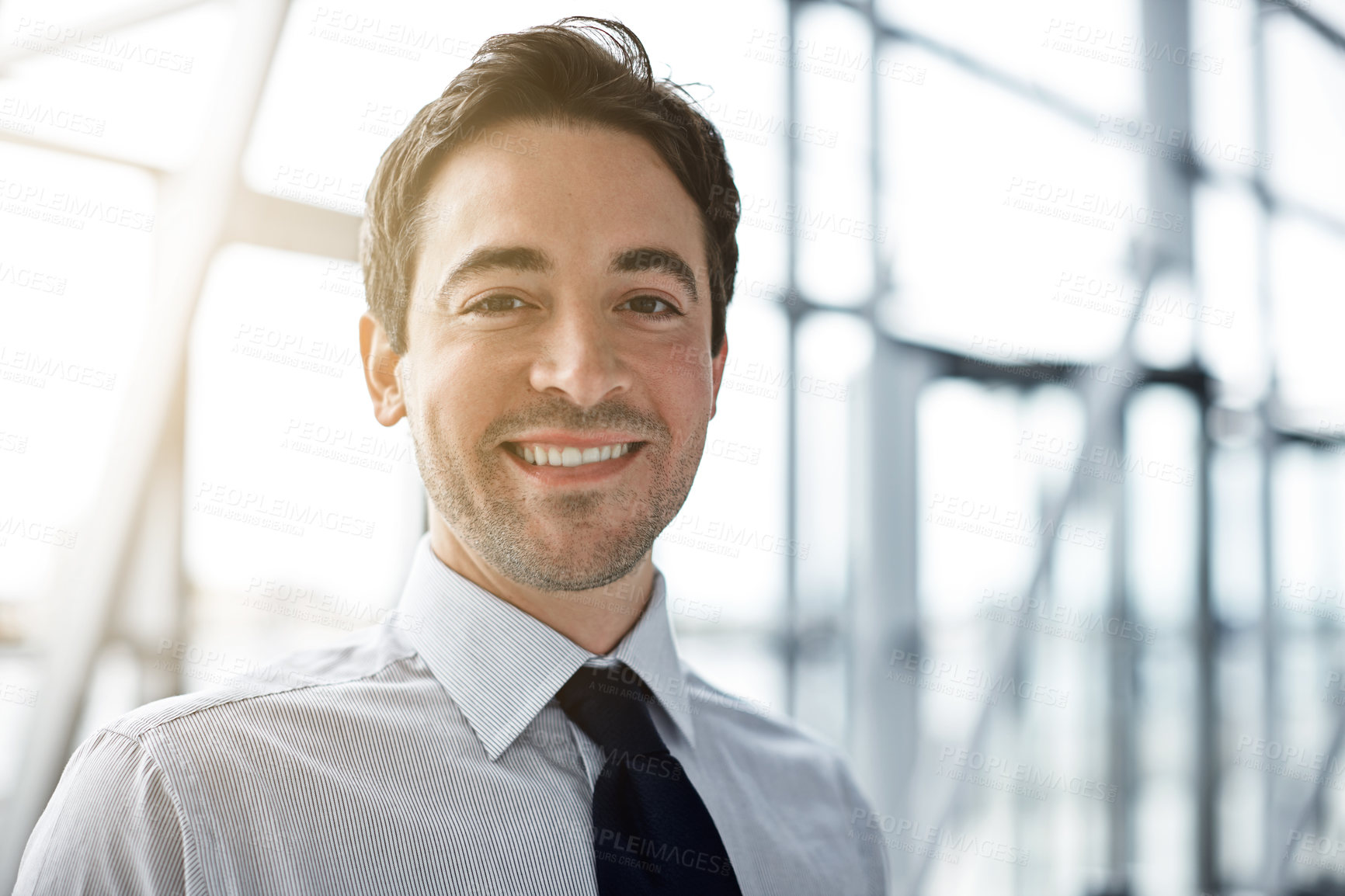 Buy stock photo Cropped portrait of a businessman standing in the lobby