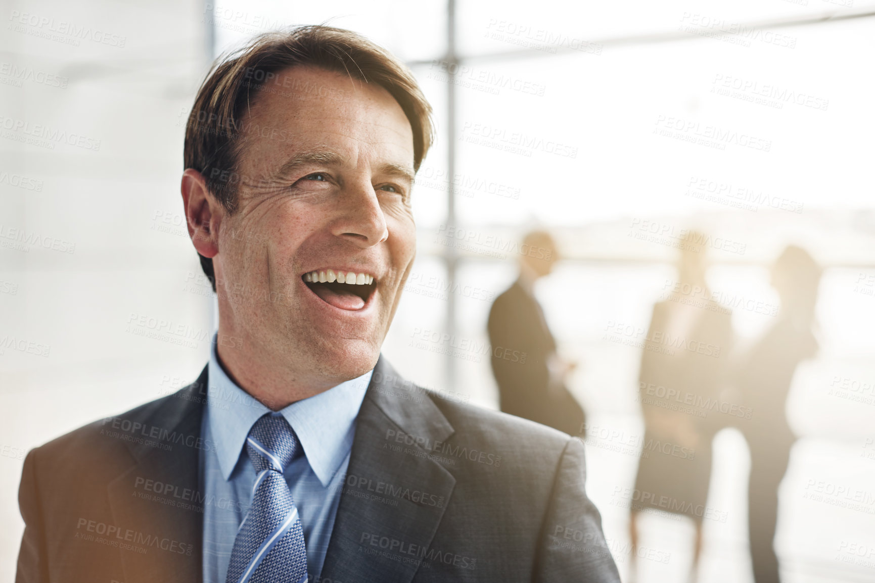 Buy stock photo Happy, businessman and laughing with vision for corporate ambition, comedy or humor in workplace. Man, employee or smile with lens flare for funny business, company idea or success in building sector