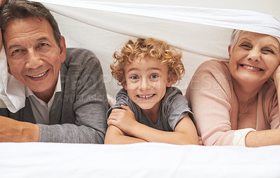 Buy stock photo Portrait, grandparents or happy boy in bedroom to relax together for bonding in Australia with love at home. Morning, faces or grandmother with funny cute kid or old man to enjoy quality time on bed