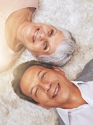 Buy stock photo Portrait, senior or happy couple on carpet to relax in home for bonding or support together. Above, old people or man lying down on floor by an elderly woman for love, retirement or care in marriage