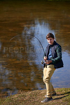 Buy stock photo Lake, fishing and happy kid with pole in nature for vacation, fun or travel adventure outdoor. Fish, river and boy in a forest for skill development, learning or sustainable living while camping 