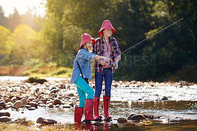 Buy stock photo Countryside, activity and children fishing in river on holiday break, vacation or adventure as hobby. Sunshine, girls or siblings and rod to catch fish in water on weekend trip, outdoor and nature