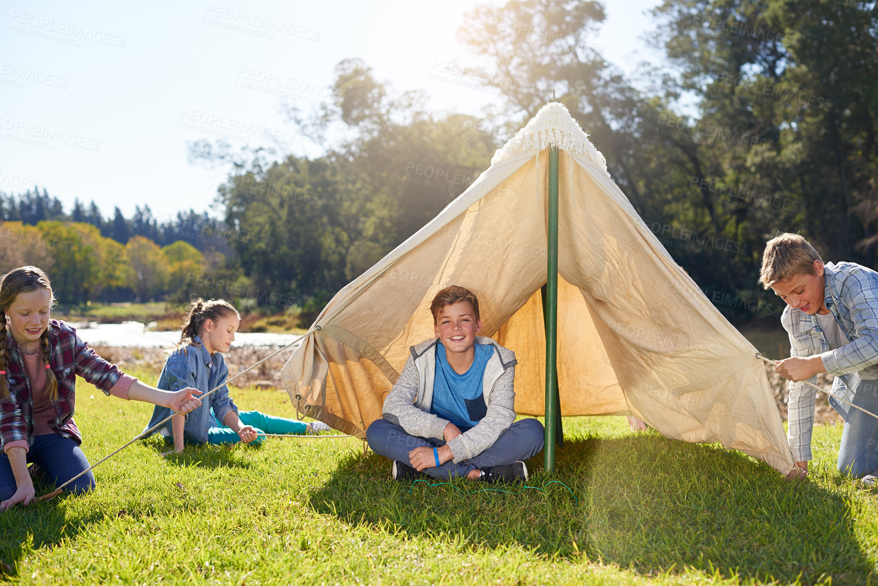 Buy stock photo Shot of a group of children on a camping trip