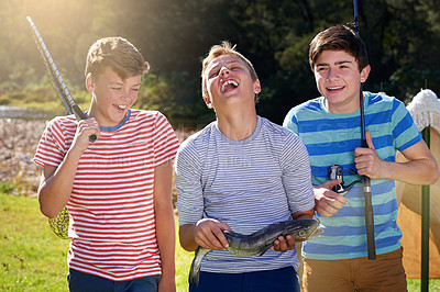 Buy stock photo Laugh, boys and friends with fishing and reel, smile and proud on camping holiday. Face, happy and rod and net with gear for fun hobby, young men and dinner caught on vacation by river with mates