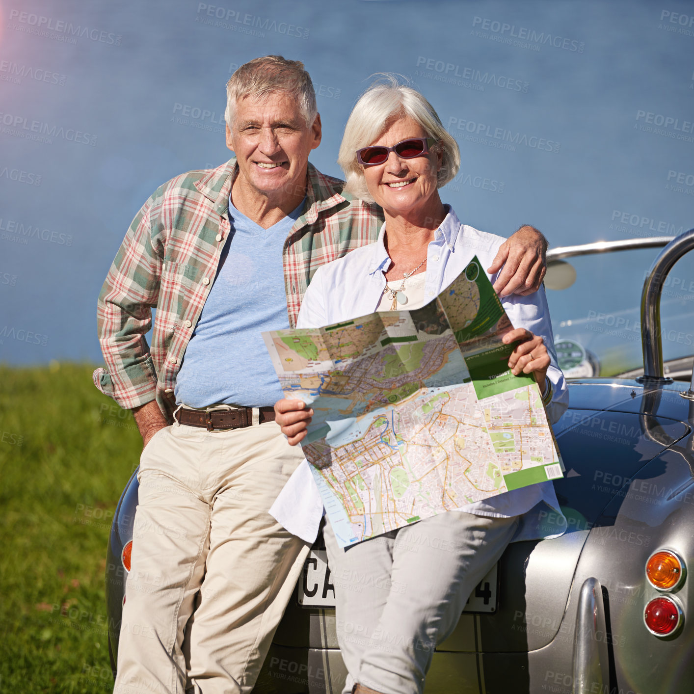 Buy stock photo Portrait of a happy senior couple enjoying a road trip together