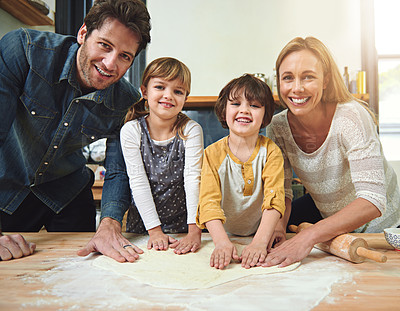 Buy stock photo Portrait, smile and family baking pizza in kitchen together, bonding and happy for learning in home. Face, mother and father with kids cooking, teaching and help parents with flour dough at table