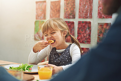 Buy stock photo Happy, family and eating pizza at dinner table for conversation, affection and love at home. Young girl and parents with fast food or take away for easy meal at night with communication and support