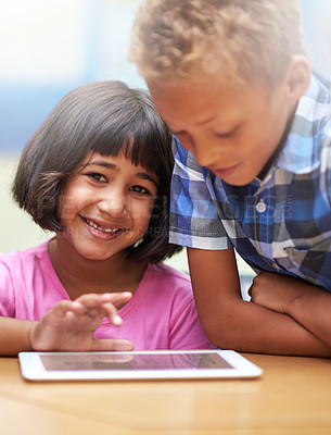 Buy stock photo Happy children, tablet and classroom for elearning, education or online lesson together at school. Young boy, girl or elementary kids smile on technology for games, entertainment or virtual class