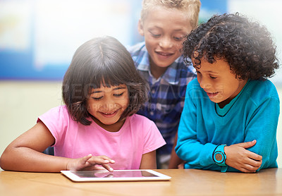 Buy stock photo Students, kids on tablet and school for online education, e learning and website or information in group. Happy children in diversity with digital technology for knowledge and classroom development