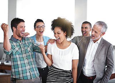 Buy stock photo Portrait of a group of colleagues cheering while standing in an office