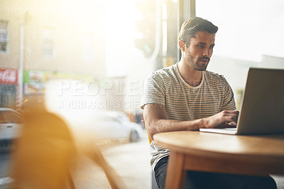 Buy stock photo Coffee shop, working and man with laptop and lens flare doing code remote work in a cafe. Tech, email and male freelancer customer at a restaurant and computer writing with focus on web coding