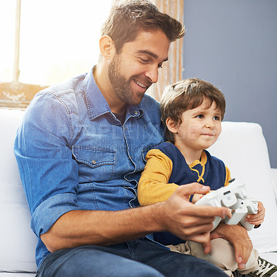 Buy stock photo Love, father and son with video game, happiness and gaming at home, loving or smile. Family, male parent or dad with a kid, boy or child with technology, bonding or quality time with games or playing