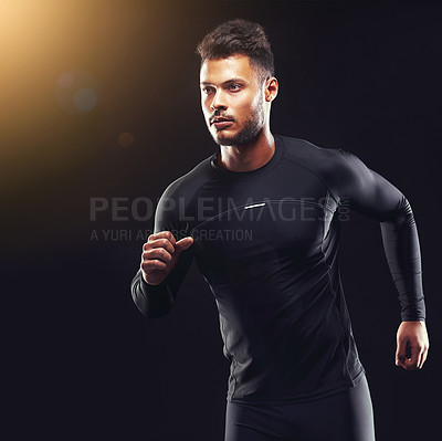 Buy stock photo Exercise, athlete and runner man in studio for sprint workout, marathon or competition with black background. Sport, lens flare and male model person for speed, endurance training and wellness