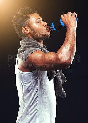 Buy stock photo Fitness, studio and man with muscle drinking water, relax and workout routine for health, wellness and power. Bottle, hydrate and strong athlete on black background for exercise, results and progress