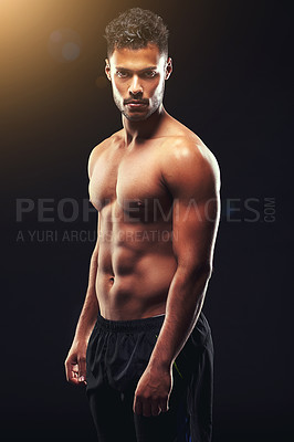 Buy stock photo Fitness, confident and portrait of man in studio with muscle, flare and workout routine in health, wellness or power. Serious, pride and strong athlete on black background for exercise, body and care