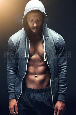 Buy stock photo Fitness, hoodie and man in studio with muscle, confidence and workout routine in health, wellness and power. Commitment, pride and strong athlete on black background for exercise, body and care