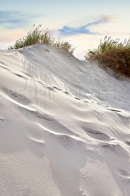 Buy stock photo Landscape of sand dunes on west coast of Jutland in Loekken, Denmark. Closeup of footprints on surface texture in empty dessert with copyspace. Peaceful calm scenic to explore for travel and tourism