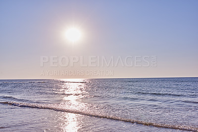 Buy stock photo Copyspace of west coast of Jutland in Denmark. Clear sky and beach during day with copy space. Blue water and seascape during holiday and vacation abroad and overseas. Sun shining over ocean water.