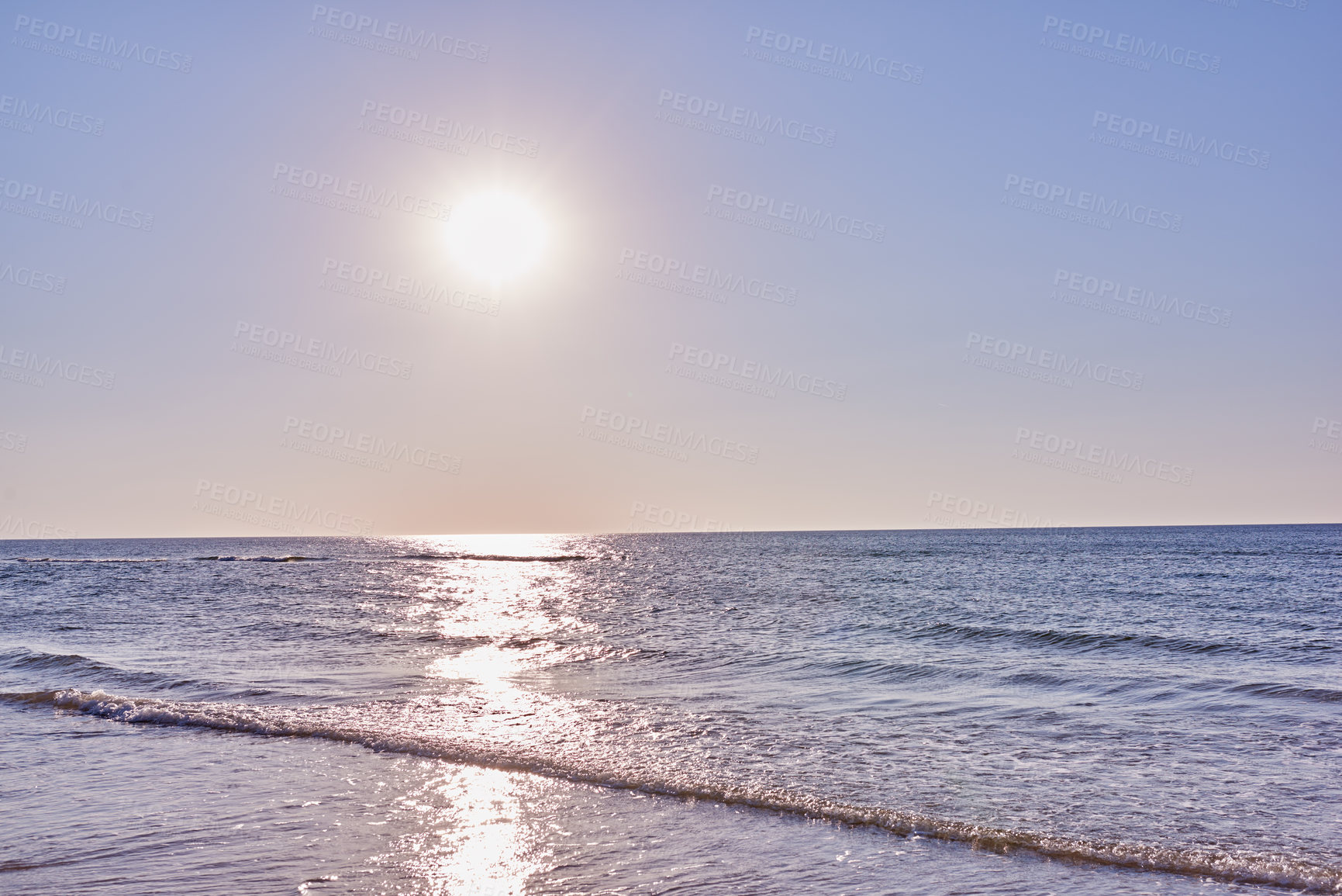 Buy stock photo Copyspace of west coast of Jutland in Denmark. Clear sky and beach during day with copy space. Blue water and seascape during holiday and vacation abroad and overseas. Sun shining over ocean water.