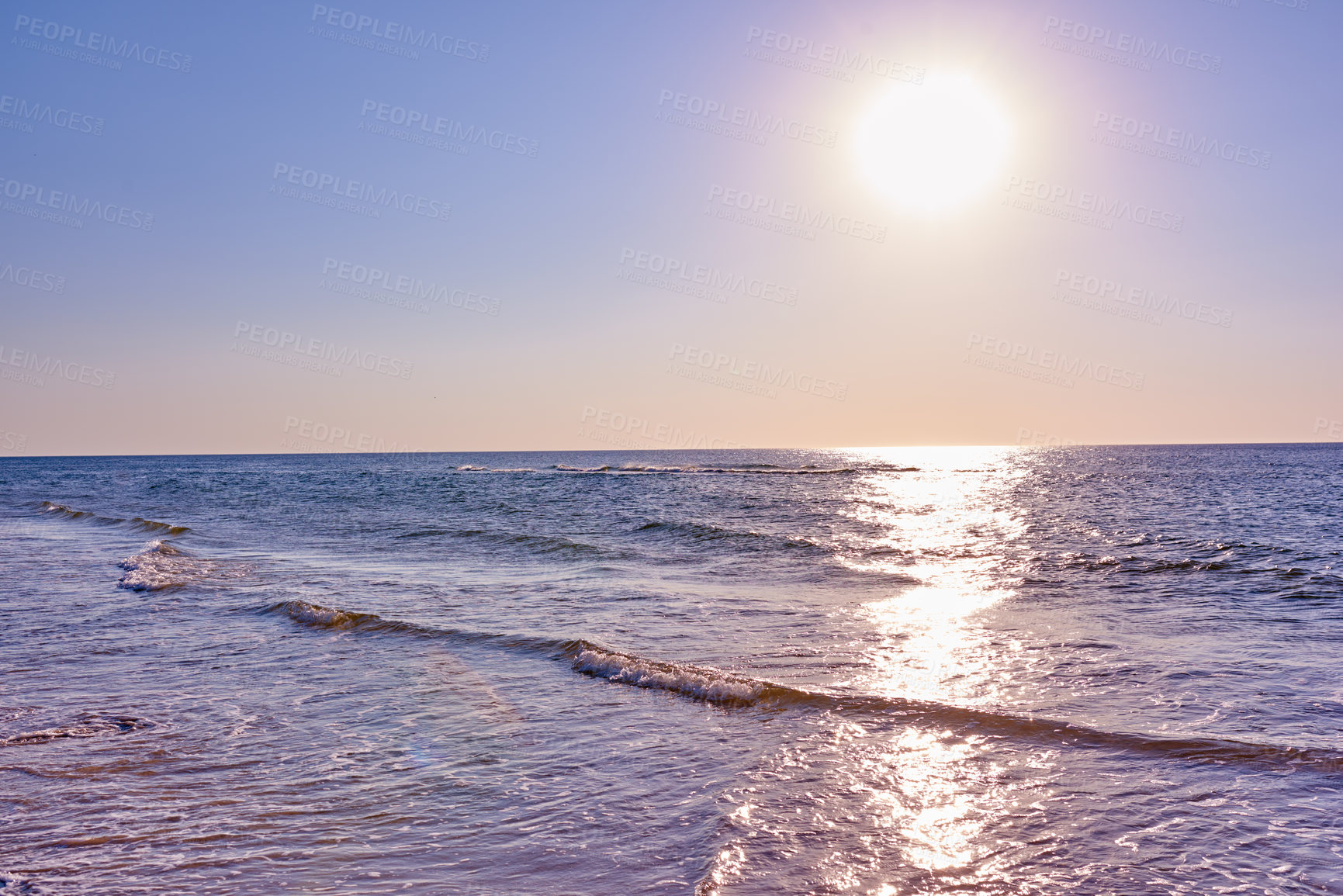 Buy stock photo Copyspace of west coat of Jutland in Denmark. Clear sky at the beach during the day with copy space. Sun shining over the ocean waves. Blue water and seascape during holiday and vacation abroad