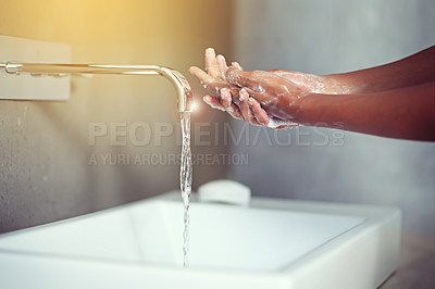 Buy stock photo Hands, water and soap for cleaning with person in bathroom, hygiene and wellness for protection from germs. Bacteria, virus and disinfection at sink with foam, skincare and cosmetics in routine