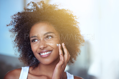 Buy stock photo African woman, skin and cream in bathroom for beauty, wellness and afro in home to start morning routine. Girl, person and serum for cosmetics, change and transformation with facial glow in apartment