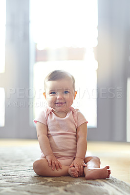 Buy stock photo Portrait of an adorable baby girl sitting on the living room floor