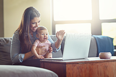 Buy stock photo Mother, baby or waving on laptop video call in house or home living room in social distancing communication. Smile, happy or hello mom and child girl on sofa zoom technology for social network talk