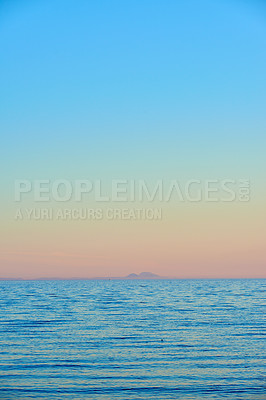 Buy stock photo Seascape and landscape of a golden sunset on the west coast of Jutland in Loekken, Denmark. Beautiful view on an empty beach at dusk. Sun rising over the ocean and sea in the morning with copyspace