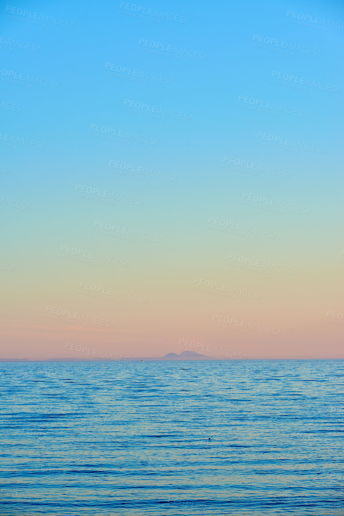 Buy stock photo Seascape and landscape of a golden sunset on the west coast of Jutland in Loekken, Denmark. Beautiful view on an empty beach at dusk. Sun rising over the ocean and sea in the morning with copyspace