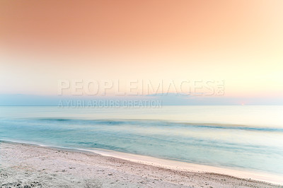 Buy stock photo Copyspace of beach and sky at sunset on the west coast of Jutland in Loekken, Denmark. Ocean waves on an empty sea shore at twilight. Calm and peaceful destination to enjoy a relaxing summer vacation