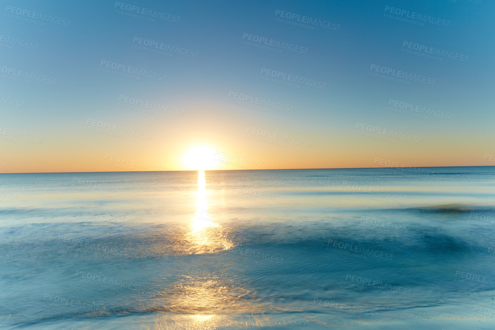 Buy stock photo Seascape and landscape copyspace of a golden sunset on the west coast of Jutland in Loekken, Denmark. Beautiful cloudscape on an empty beach at dusk. Clouds over the ocean and sea in the evening