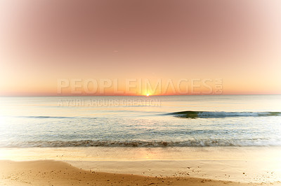 Buy stock photo Seascape and landscape of a golden sunset on the west coast of Jutland in Loekken, Denmark. Beautiful cloudscape on an empty beach at dusk. Clouds over the ocean and sea in the evening with copyspace