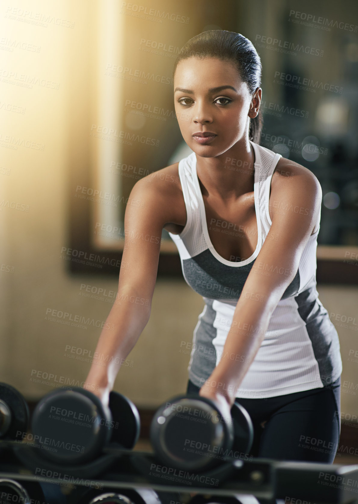 Buy stock photo Woman, portrait and dumbbells  in gym for fitness, workout and wellness for growth, sports and energy. Athlete, female bodybuilder and weights for strength, muscle growth and commitment at club