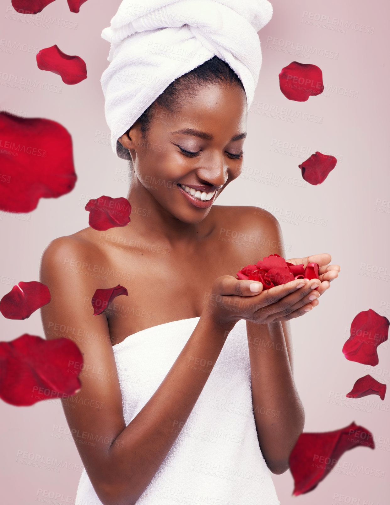 Buy stock photo Portrait, dermatology and black woman with red petals, cosmetics and luxury on a white studio background. Face, African person and model with natural beauty and grooming with treatment and aesthetic