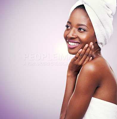 Buy stock photo Mockup, black woman or hair towel in studio with skincare, wellness or beauty on purple background. Makeup, cleaning or hands on face of African female model touching soft, skin or cosmetic results