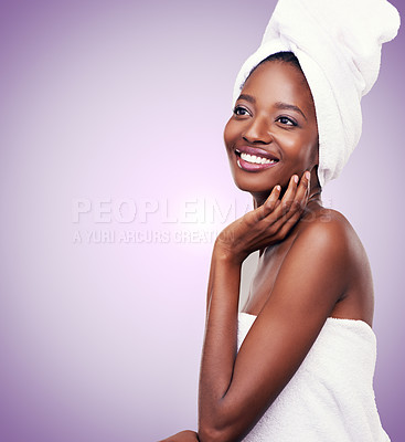 Buy stock photo Woman, skincare and thinking of beauty in studio with towel for hygiene, spa or dermatology on a purple background. Young model or African person with ideas and vision for cosmetics and wellness