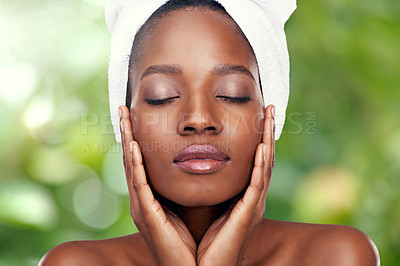 Buy stock photo Skincare, towel and face of black woman on green background for cleaning, beauty and wellness. Salon aesthetic, dermatology and isolated person for natural skin, washing and spa facial with plants
