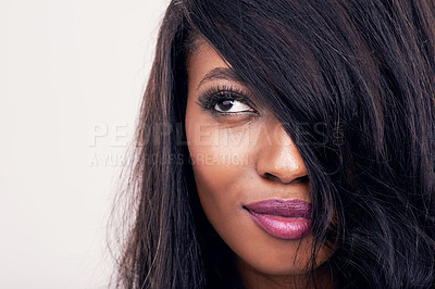 Buy stock photo Beauty, hair and face of black woman in studio for makeup, human extensions or cosmetics. Headshot of african female model on a white background thinking of salon mockup, skin glow or luxury skincare