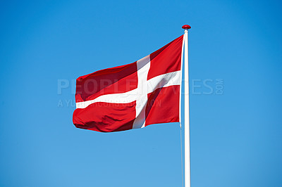 Buy stock photo Flag, blue sky and denmark with symbol of country, scandinavian or danish state with red and white cross. Wind, pole or colorful representation of Dannebrog, history or nation in Copenhagen or Europe