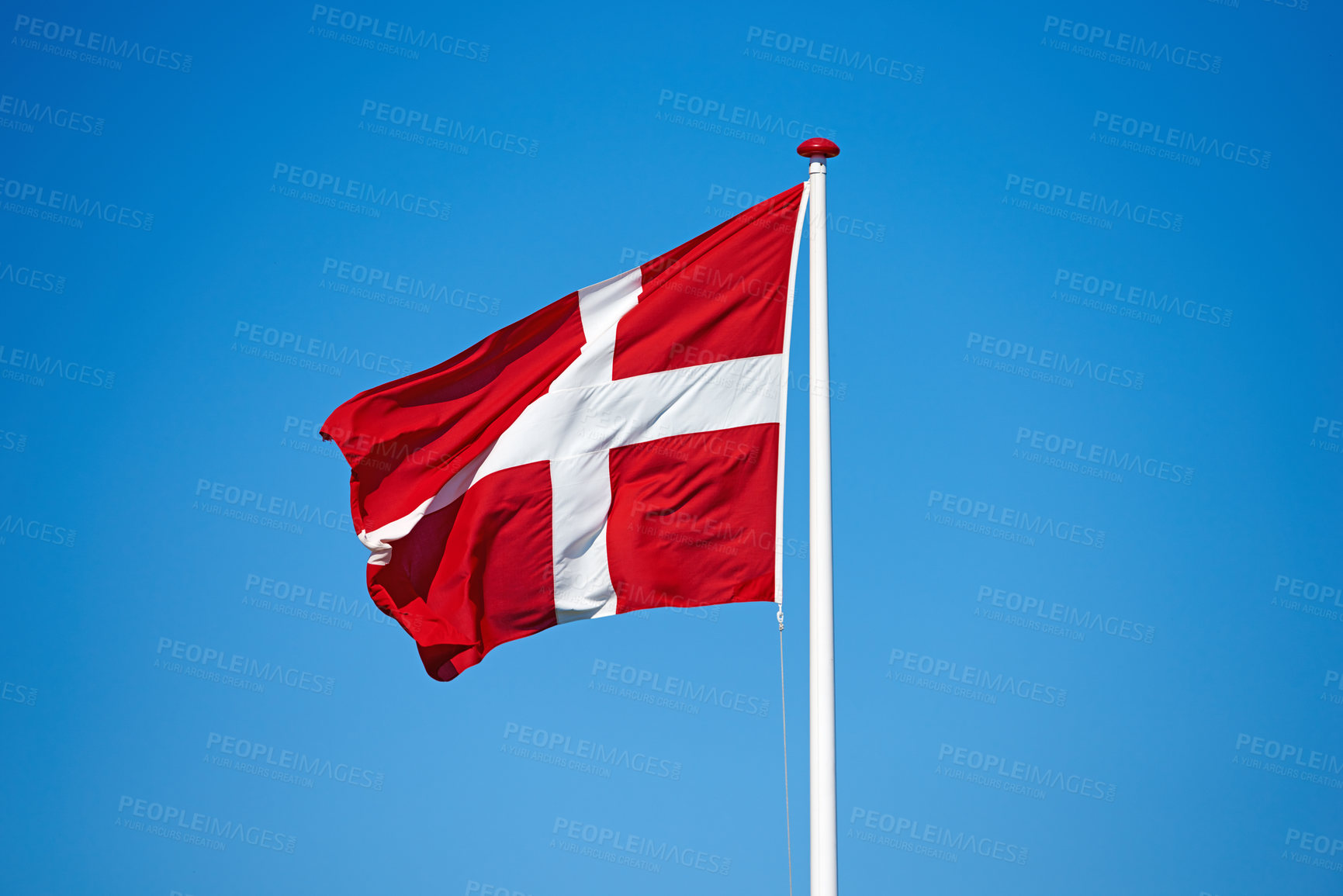 Buy stock photo Flag, blue sky and denmark with symbol of scandinavian country or danish state with red and white cross. Wind, pole and colorful representation of Dannebrog, history or nation in Copenhagen or Europe