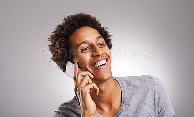 Buy stock photo Face, phone call and communication with young man in studio on gray background for conversation. Smile, contact and technology with happy young person speaking on mobile for chat or connection