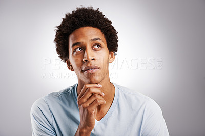 Buy stock photo Thinking, idea and man in studio with mockup for planning, solution or mind map on grey background. Why, questions or African model with emoji guess for brainstorming, problem solving or opinion