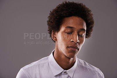 Buy stock photo Depression, mental health and tired black man in portrait with exhaustion or burnout from work stress. Sad, african male person and anxiety from loneliness, grief or loss isolated at gray background