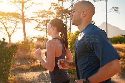 Buy stock photo Sunrise, forest and friends running as exercise or morning workout for health and wellness together. Sport, man and woman runner on trail run with athlete as training in nature for sports or energy