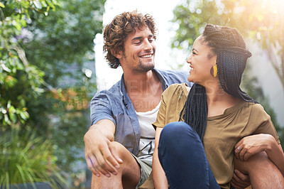 Buy stock photo Interracial couple, outdoor and smile for summer, park and date together or bonding of boyfriend and girlfriend. Male and female person for nature, happy and love for outside as students or city life