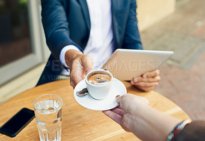Buy stock photo Waiter, serving and hands with coffee on table at cafe with customer reading tablet for internet, news or article. Restaurant, service or person pov giving espresso to man with tech on social media